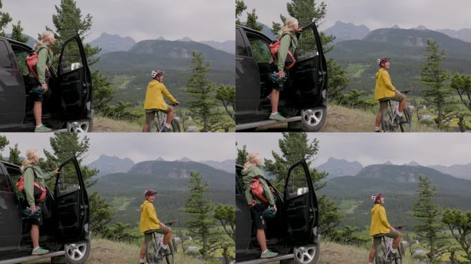 骑山地自行车的老夫妇在小货车旁准备骑车