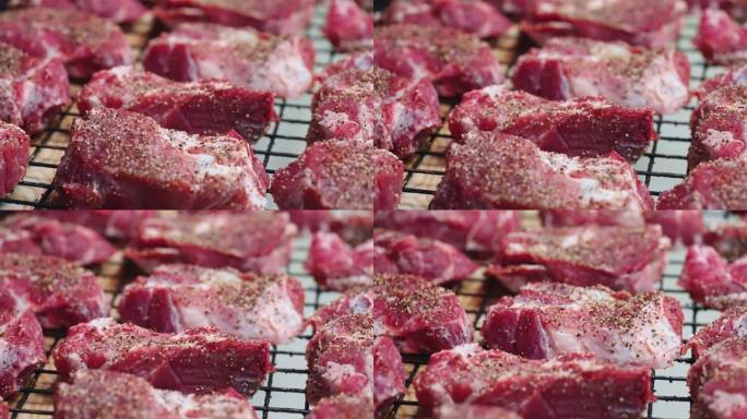 一块生牛肉与香料和盐，美味的牛排从大理石牛肉在豪华餐厅
