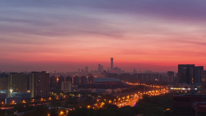 北京城市日出朝霞国贸和南站延时摄影