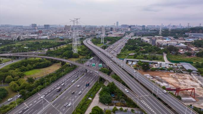 航拍城市电塔公路道路车流延时