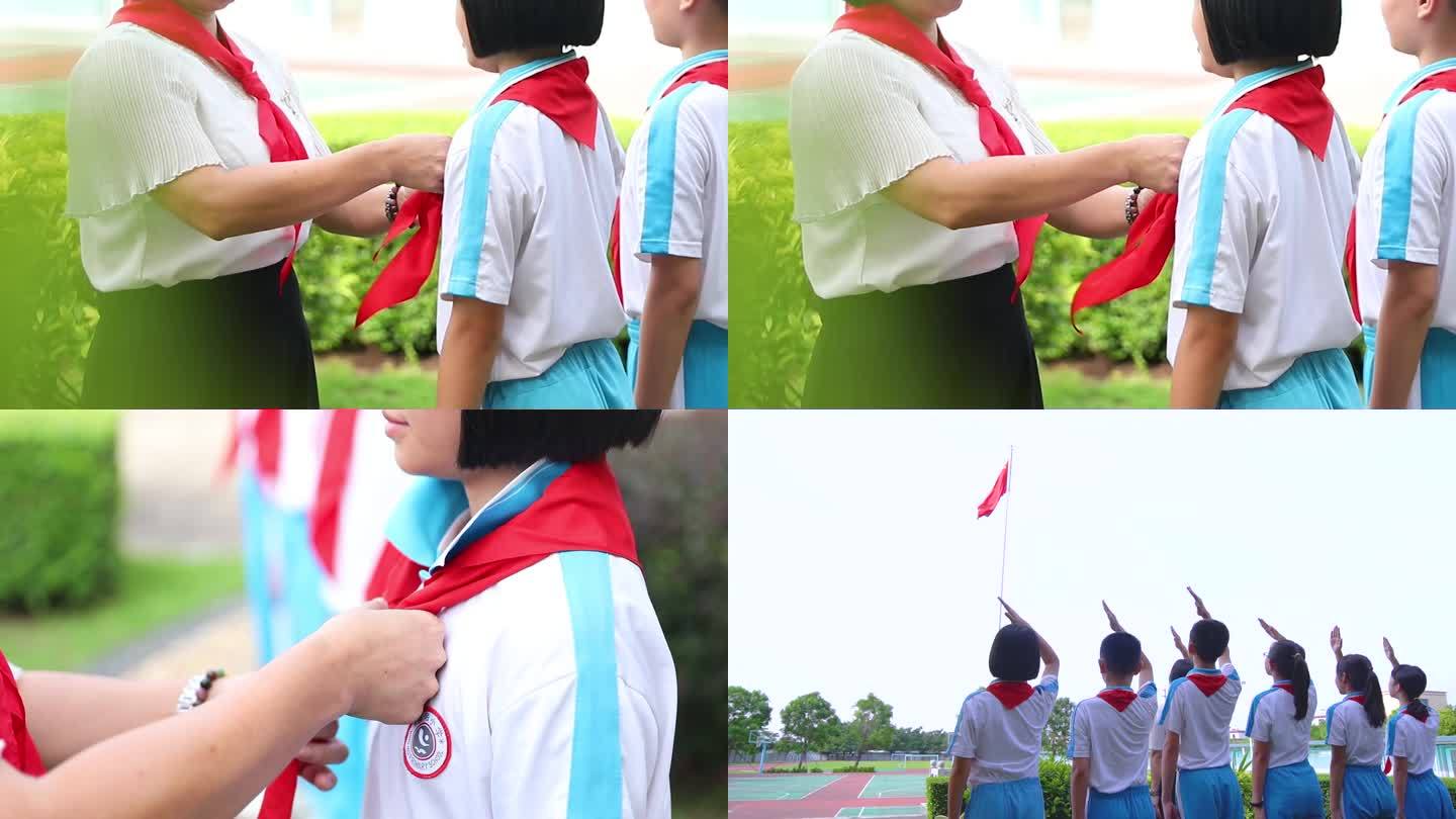 国旗下学生佩戴红领巾敬礼