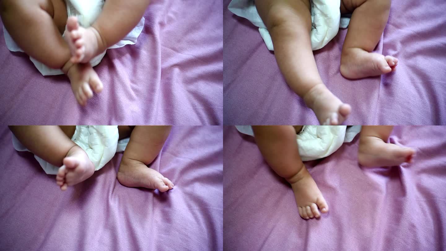 可爱的小宝宝躺在床上 婴儿幼儿小脚