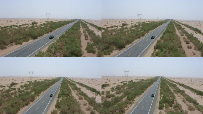 一辆旅行车在沙漠公路上行驶