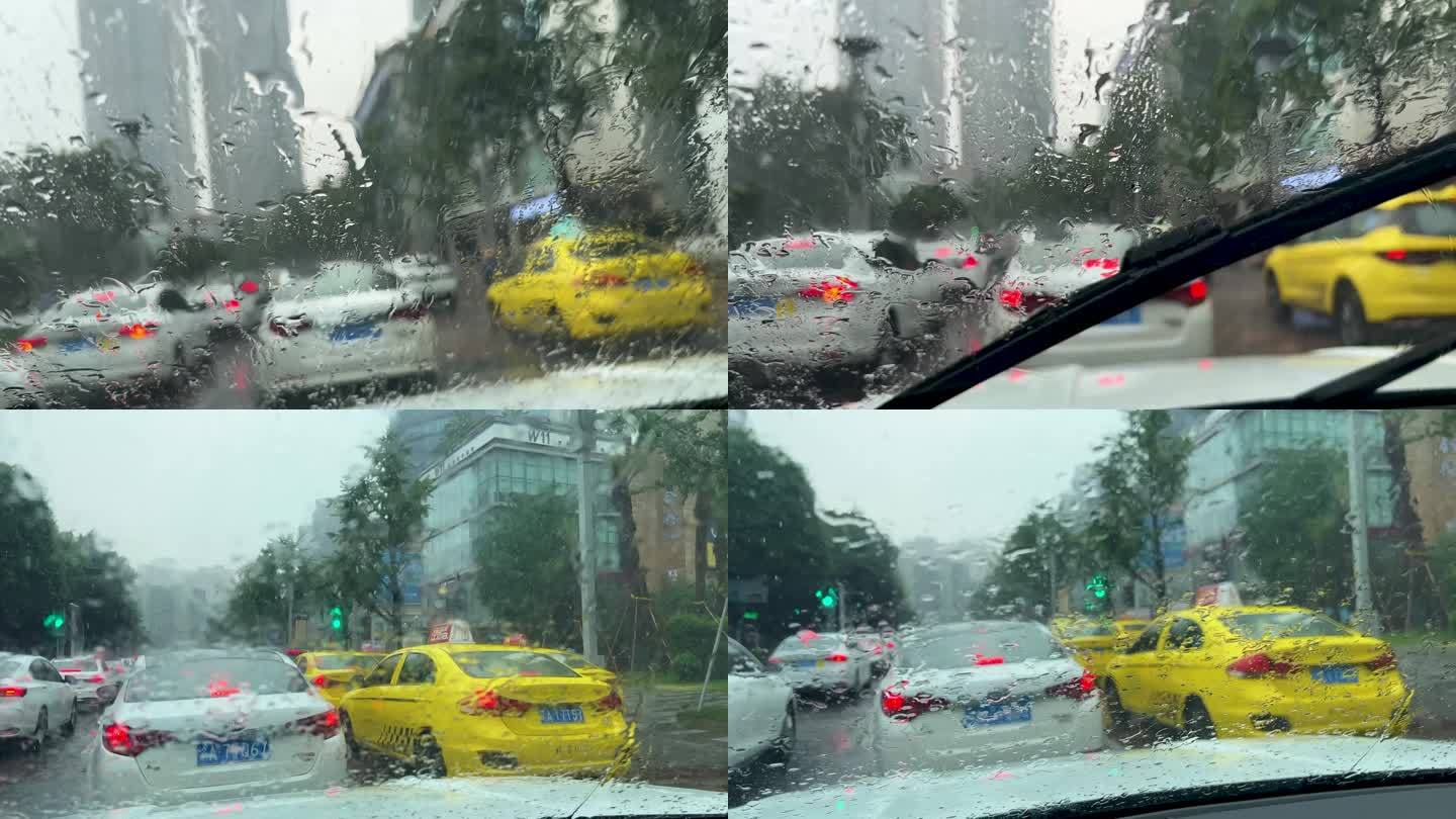 下雨城市外卖暴雨大雨堵车出租车惊蛰
