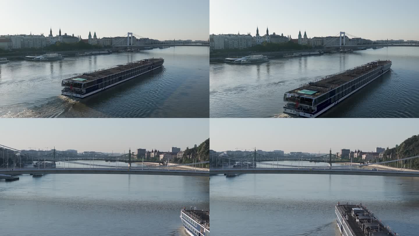 航拍客船游艇行驶在匈牙利多瑙河上穿过大桥