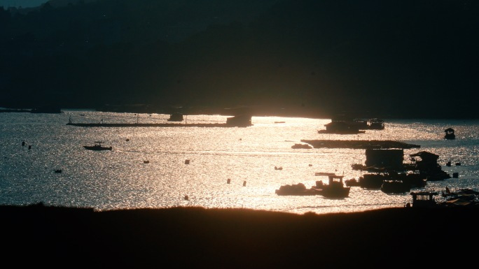 太阳下山渔船海面光影日落农村故乡家乡生活