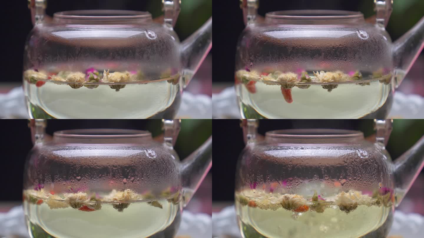 4k煮茶加热到沸腾花茶空镜沸腾 特写微距