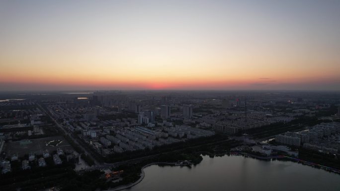 城市夕阳晚霞日落航拍东营日落