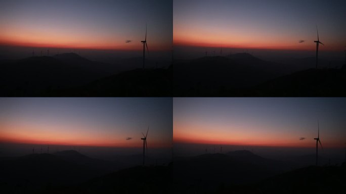 夕阳下的风力发电机