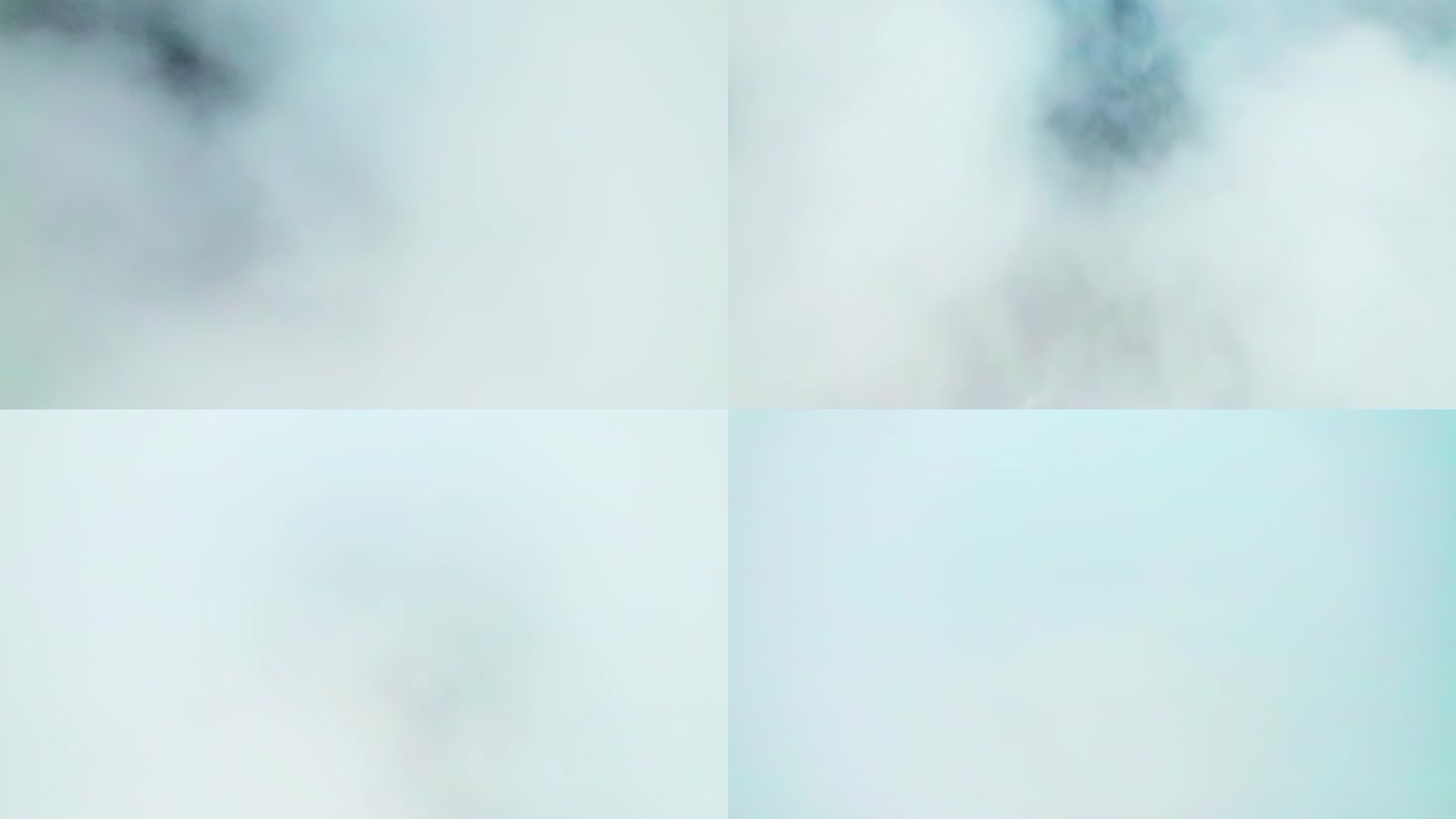 航拍无人机在风车山浓密的云雾中降落过程