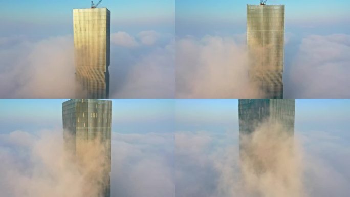 航拍清晨朝阳平流雾云层下扬州金奥中心大楼
