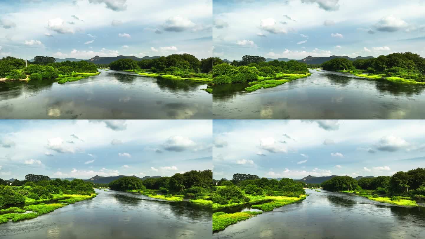 蓝天白云下桂林漓江两岸的绿洲和田园风光