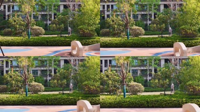 浇水 物业浇水 工人浇水 小区 居住