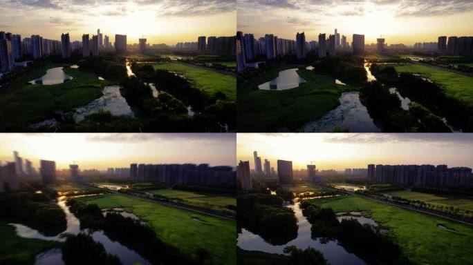 4k夕阳下安静的草坪湿地水系城市风景