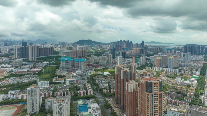 航拍阴天低空云深圳城市全景延时