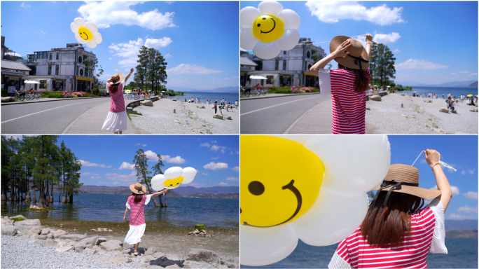 女孩在海滨公园手拉气球洱海边漫步奔跑