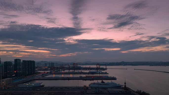 大连市东港会议中心傍晚夕阳4K航拍延时