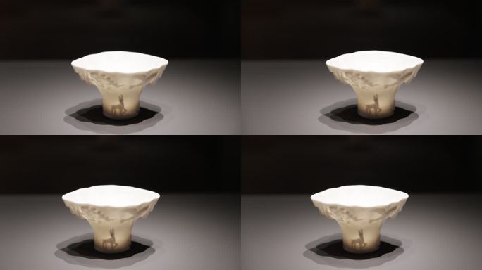 清代德化窑白釉堆塑兽纹瓷杯 杭州博物馆藏