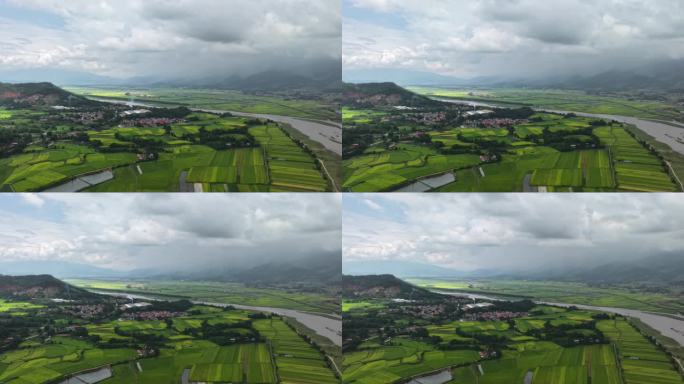 盈江县大盈江畔的稻田村庄延时视频