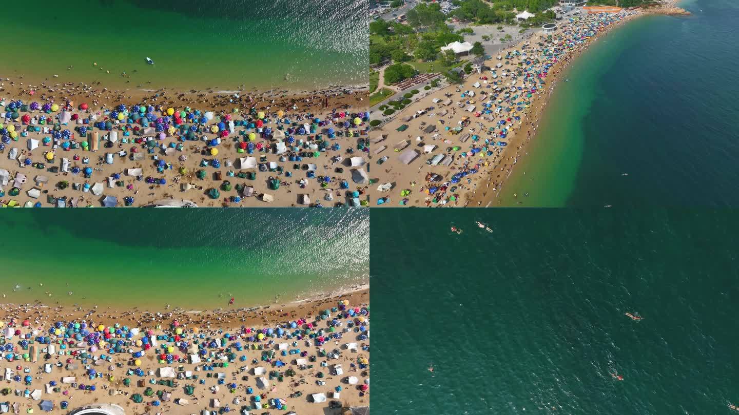 海滨浴场沙滩帐篷玩水航拍