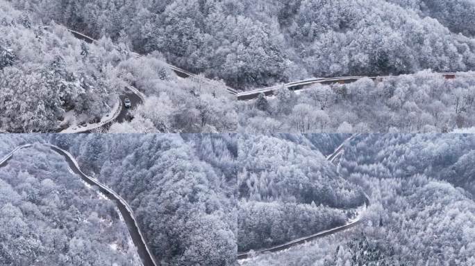 秦岭顶分水岭雪景汽车行驶盘山公路4K航拍