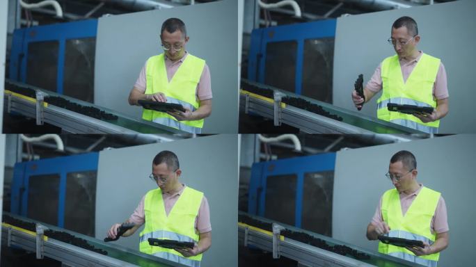 工程师在工厂车间使用平板电脑工作
