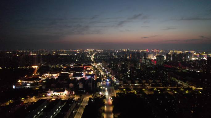 城市夜幕降临夜景灯光江苏宿迁航拍