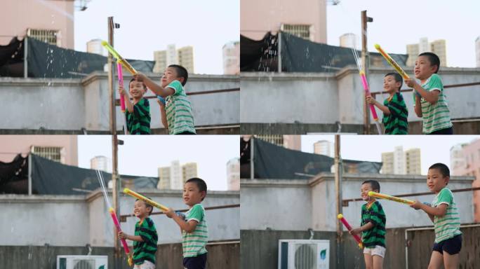 两个小孩在天台玩水枪