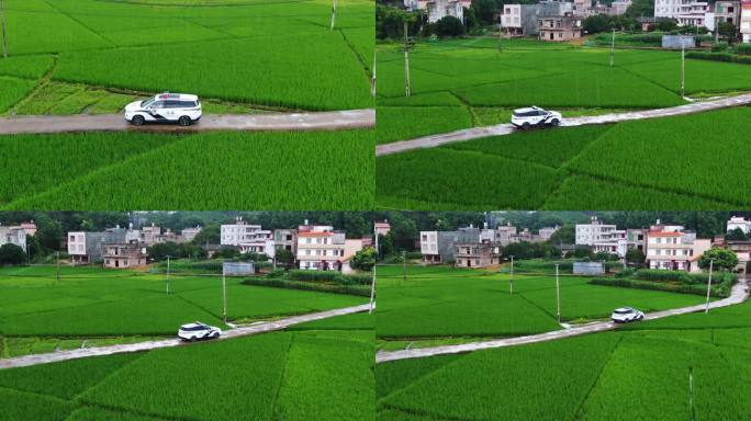 雨天警车行使在乡村路上