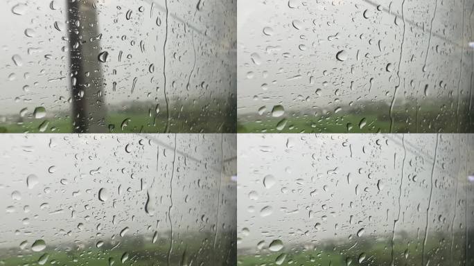 高铁车窗上的雨水