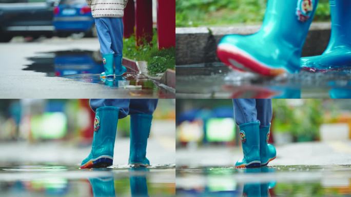 穿着蓝色雨靴的孩子在水坑中玩水
