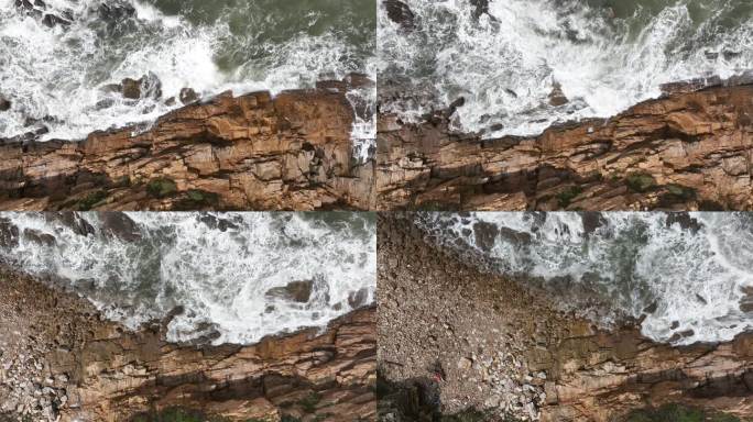 航拍威海国际海水浴场波涛汹涌的礁石海浪