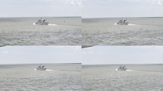 中国海警海巡艇在广阔的江面上航行巡逻