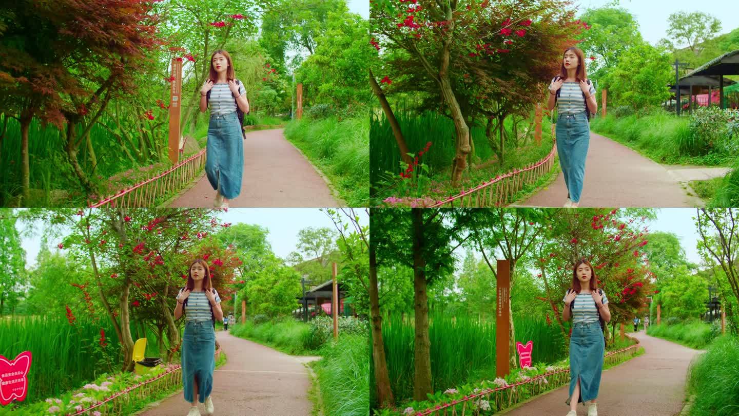 女孩漫步竹林欣赏乡村风景