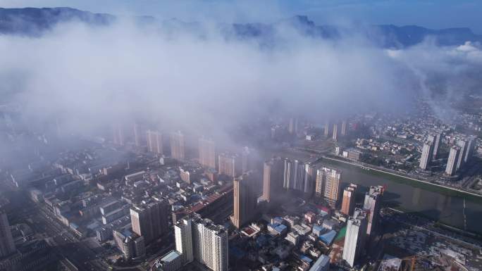 航拍云雾缭绕中的甘肃陇南成县县城古成州
