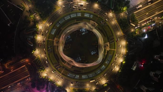 武汉光谷国际广场夜景航拍交通俯拍车流转盘