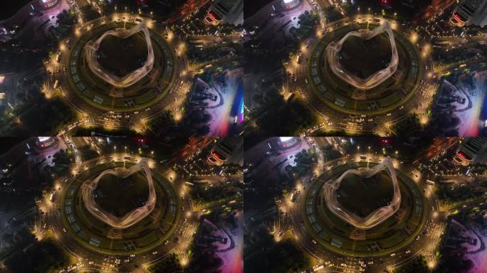 武汉光谷国际广场夜景航拍交通俯拍车流转盘