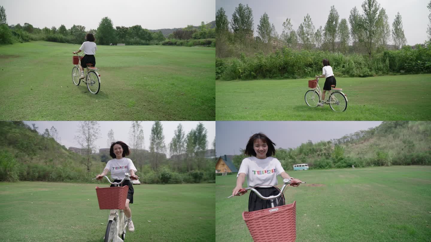 短发女生在草地上快乐地骑自行车单车