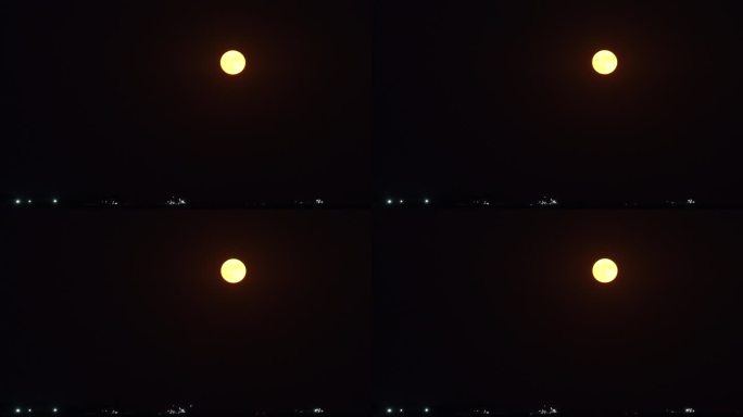海面上初升的红月亮
