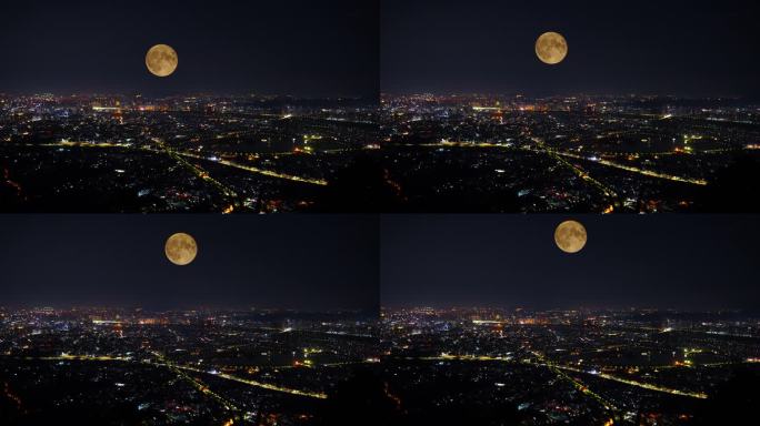 中秋节夜晚城市月亮升起延时城市夜景风光