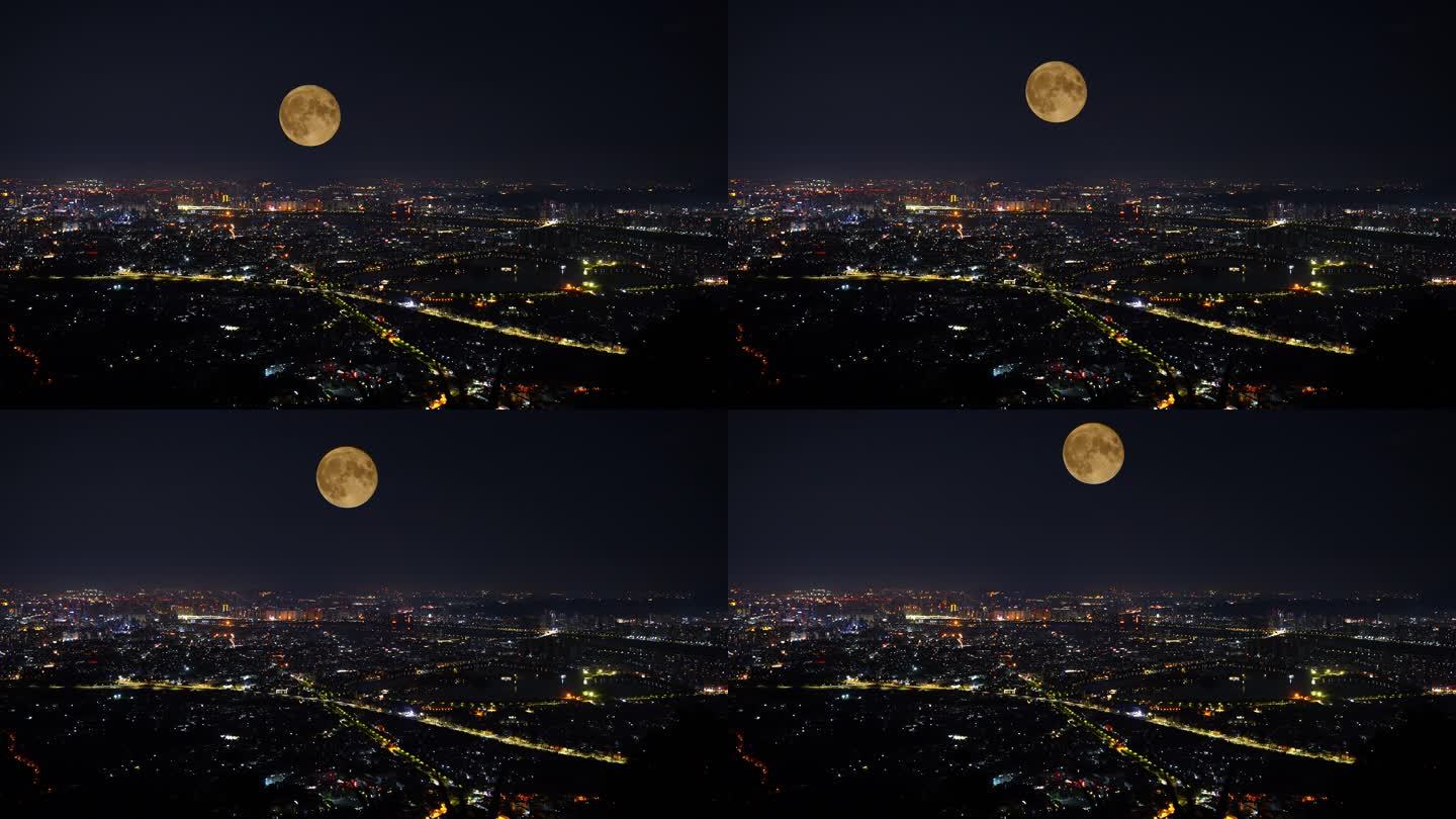 中秋节夜晚城市月亮升起延时城市夜景风光