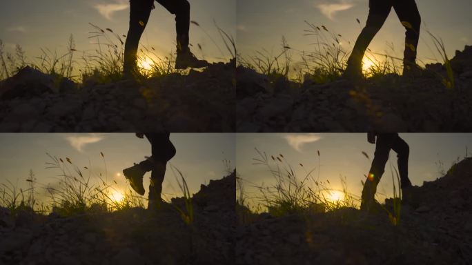 登山脚步特写登山鞋爬山夕阳 徒步登山