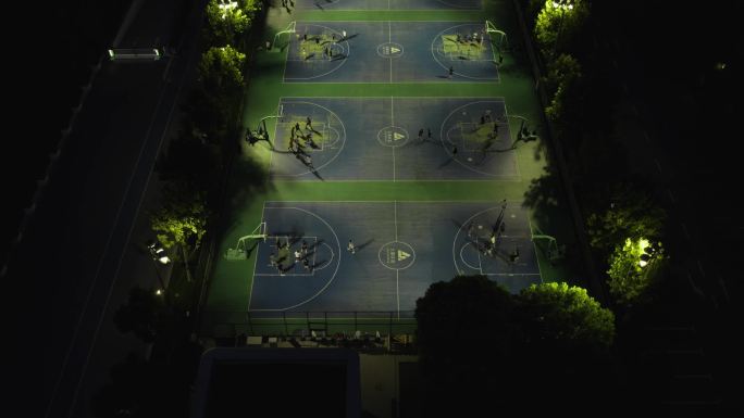 航拍夜晚篮球场打篮球