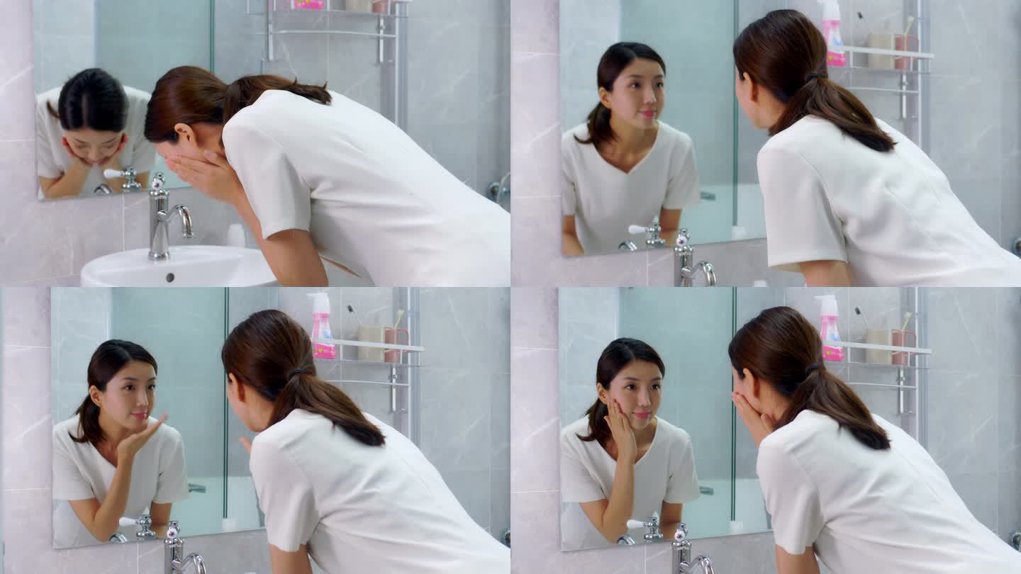 女生洗脸照镜子观察皮肤