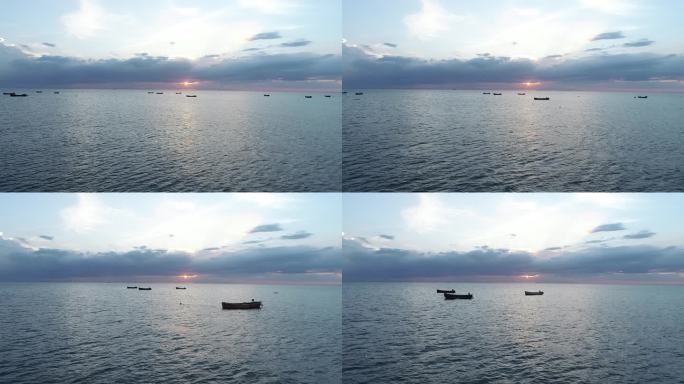 渔村航拍海上日出日落