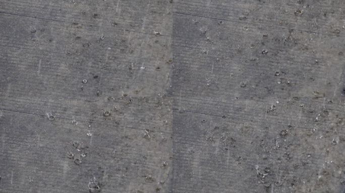 雨大雨地面水泥地雨滴大风雷阵雨慢镜头
