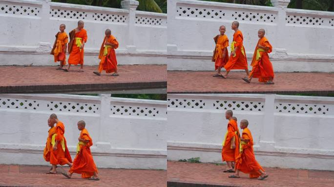 老挝和尚沙弥在街道上行走