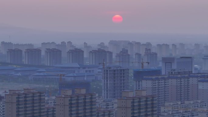 航拍乌兰察布日出城市地标