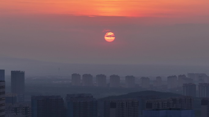 航拍乌兰察布日出城市地标