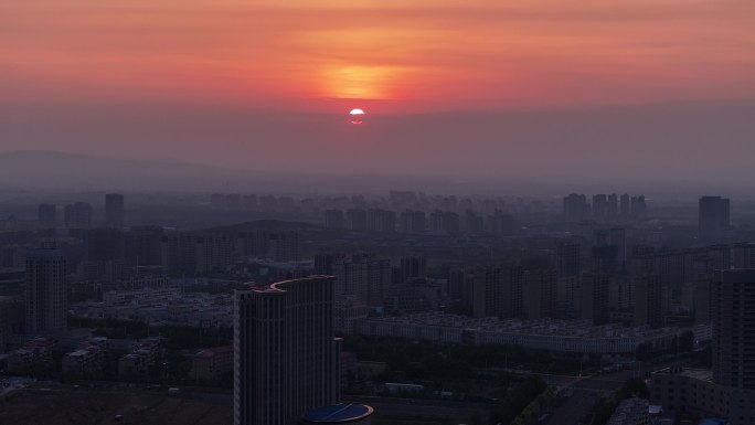 航拍乌兰察布日出城市地标